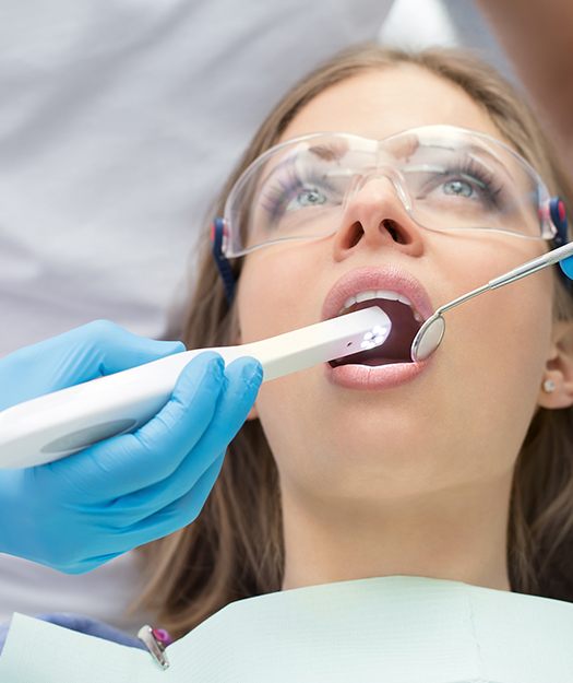 Dentist capturing intraoral images