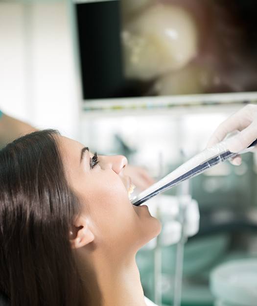 Dentist capturing intraoral images