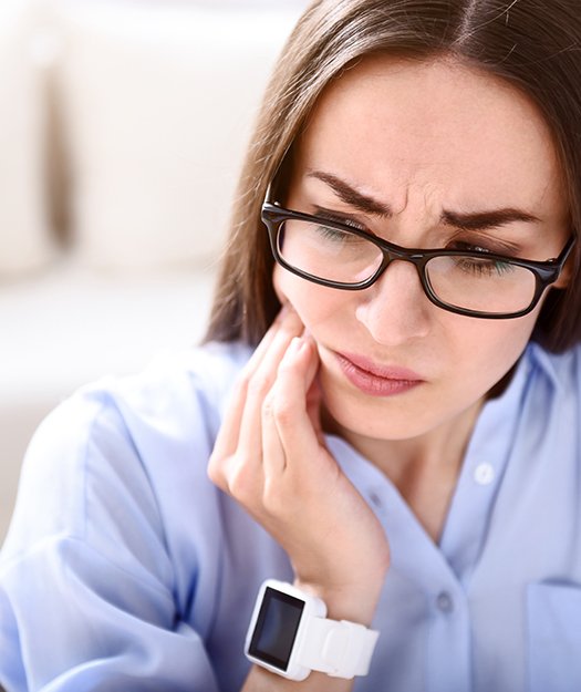 Woman with jaw pain before botox treatment for T M J