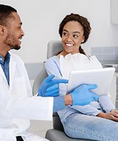 Patient visiting her Pewaukee implant dentist for checkup