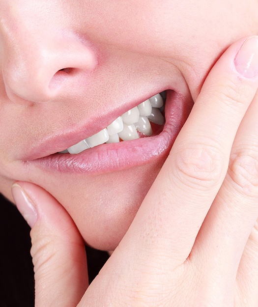 Closeup of person holding jaw before tooth extraction