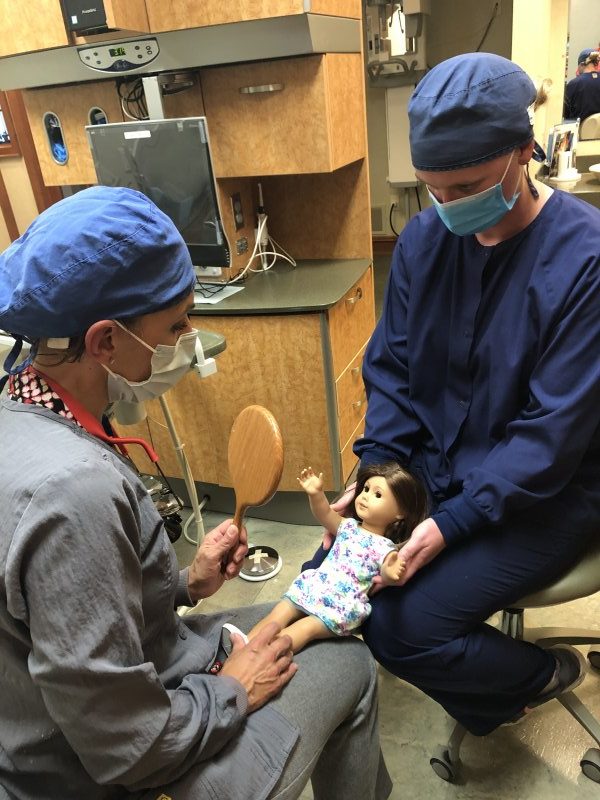 Dentist Pewaukee doing mock dental exam